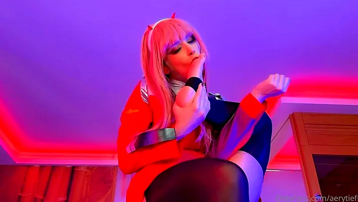 Darling In The Franxx gets her feet worshiped in this intense footjob video